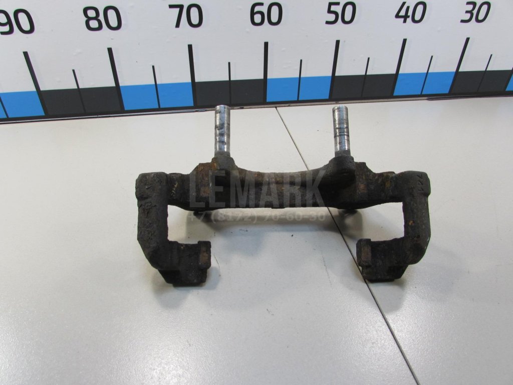 Скоба суппорта переднего