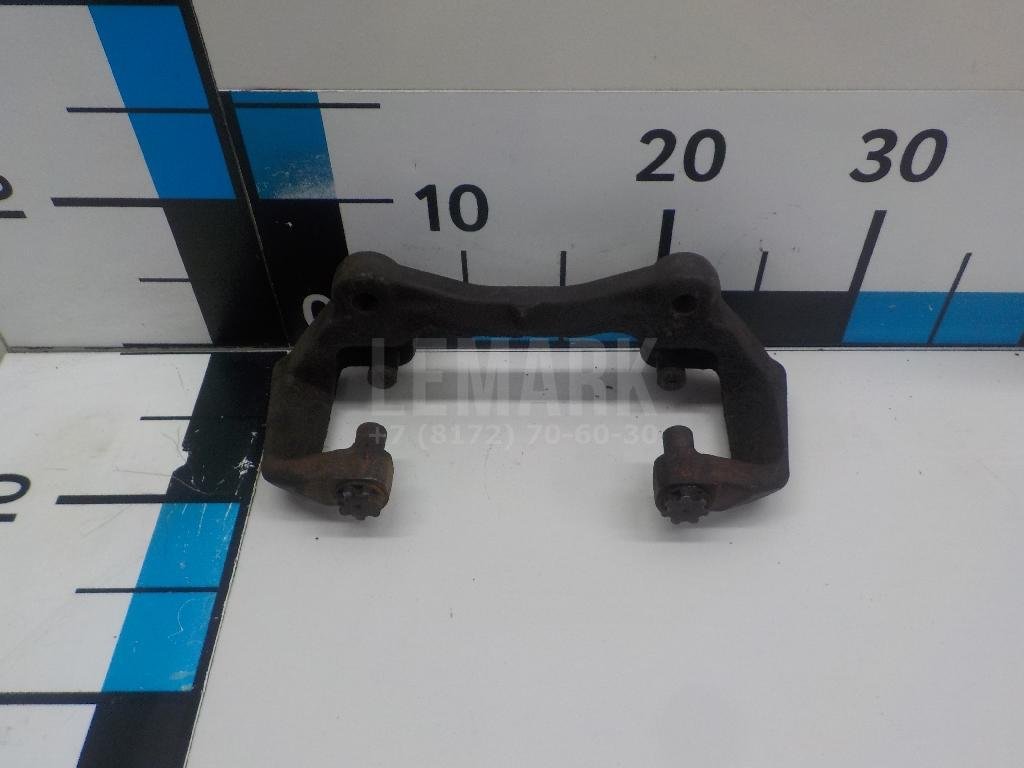Скоба суппорта переднего