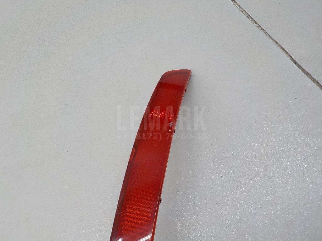 Отражатель в бампер задний левый