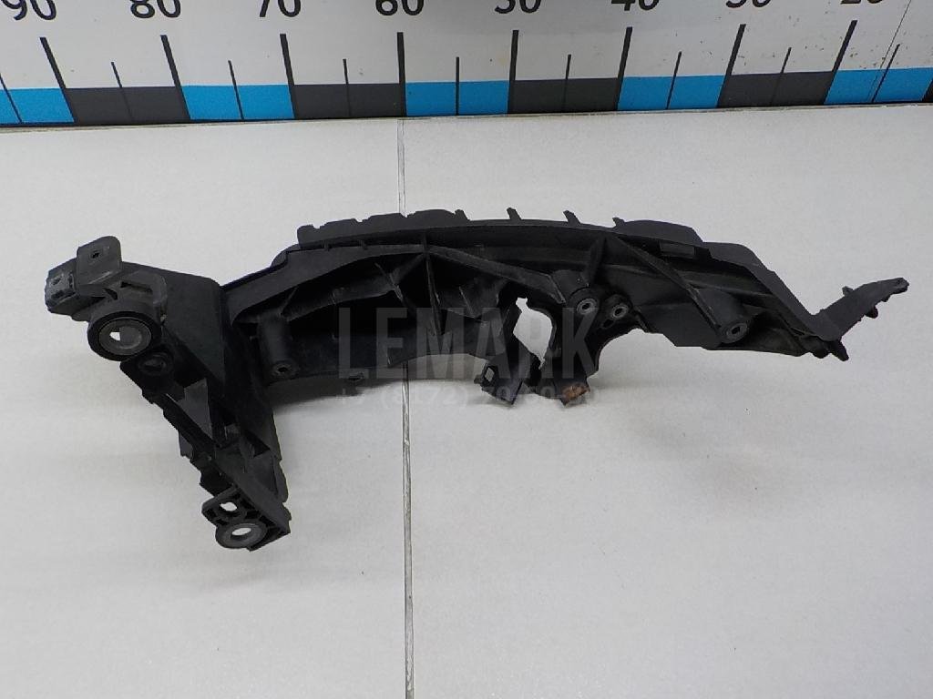 Кронштейн фар правый для  Audi 100 [C4] 1991-1994