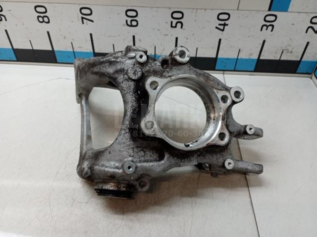 Кулак поворотный задний левый