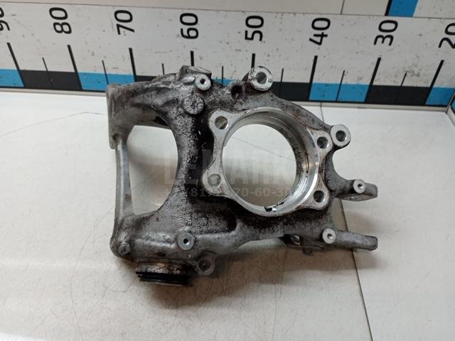 Кулак поворотный задний левый