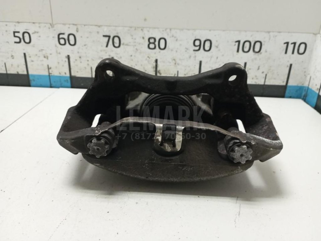 Суппорт тормозной передний левый