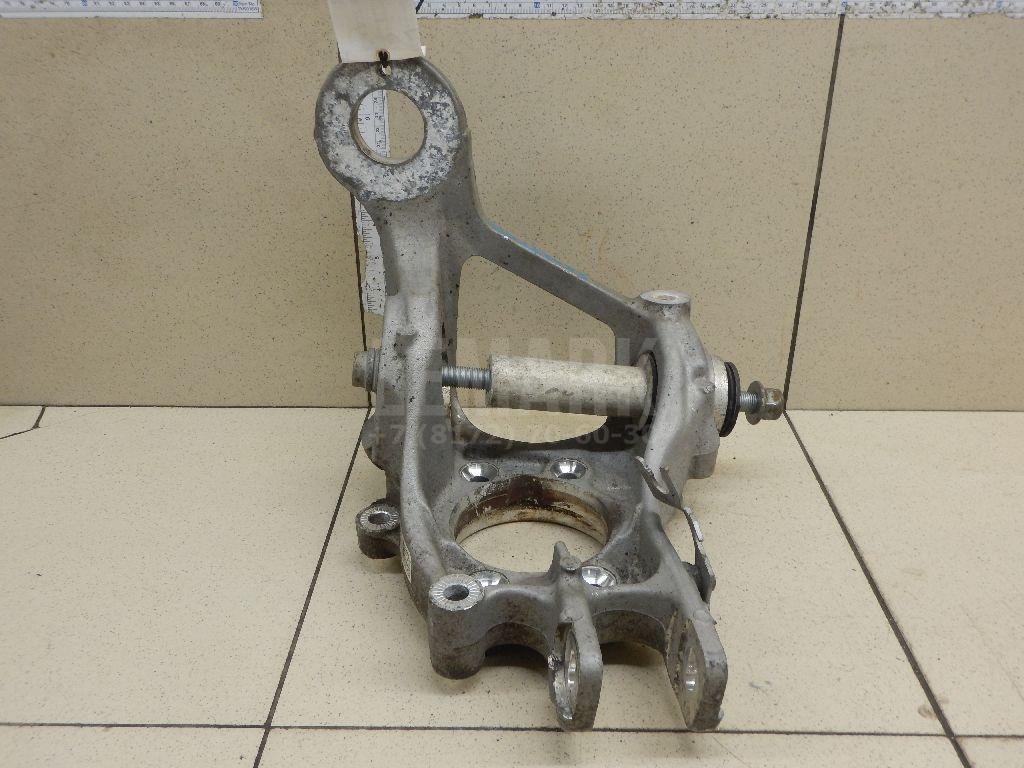 Кулак поворотный задний левый