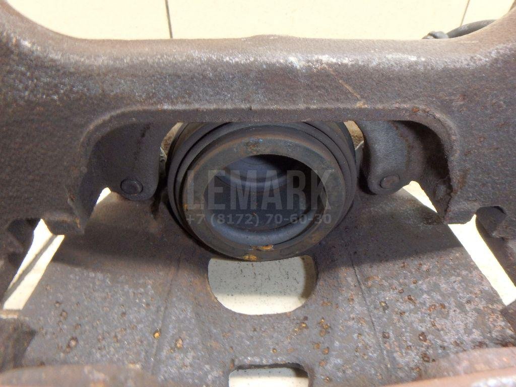 Суппорт тормозной передний левый