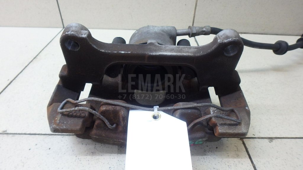 Суппорт тормозной передний левый