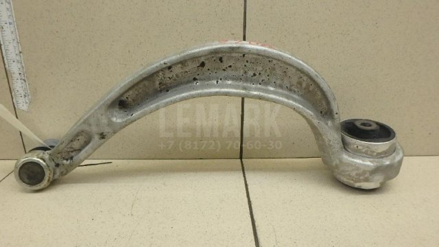 Рычаг передний нижний левый задний