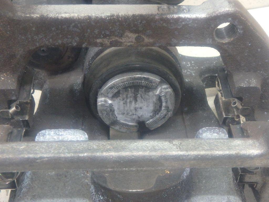 Суппорт тормозной задний левый