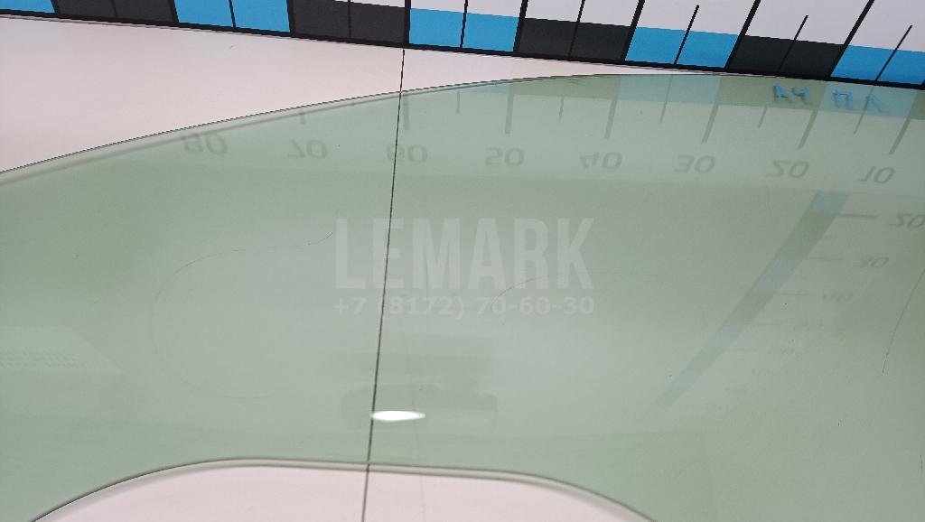 Стекло двери передней левой