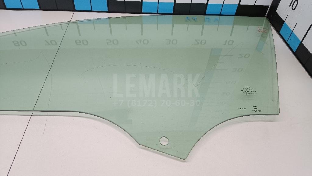 Стекло двери передней левой