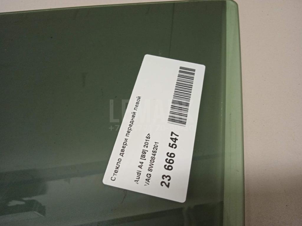 Стекло двери передней левой