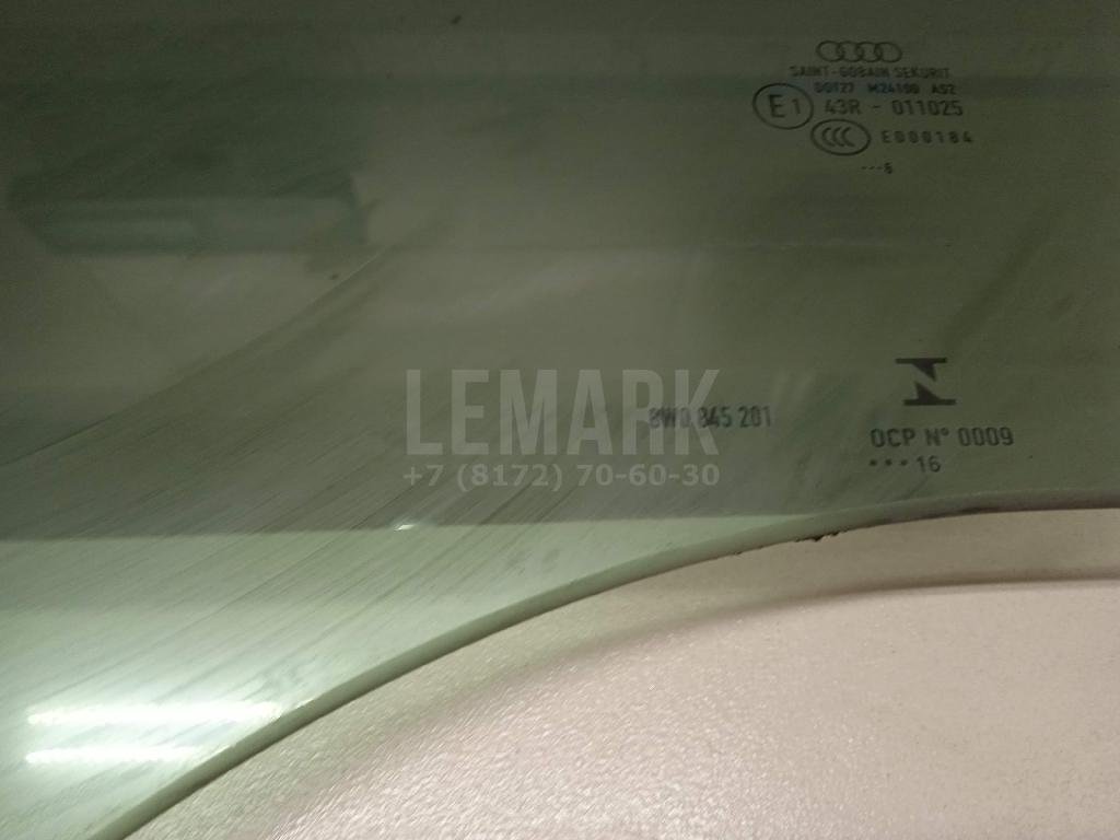 Стекло двери передней левой