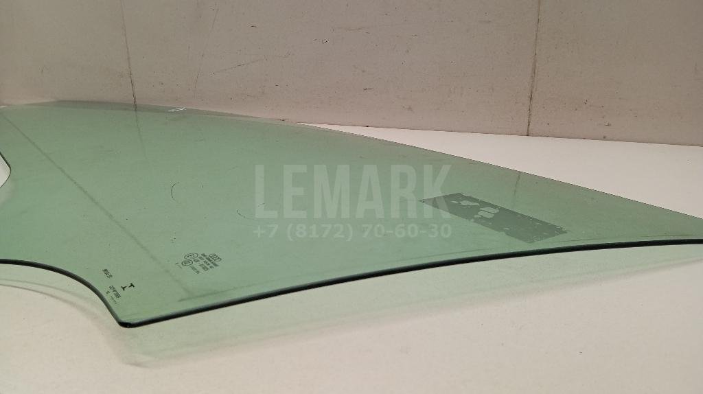 Стекло двери передней левой
