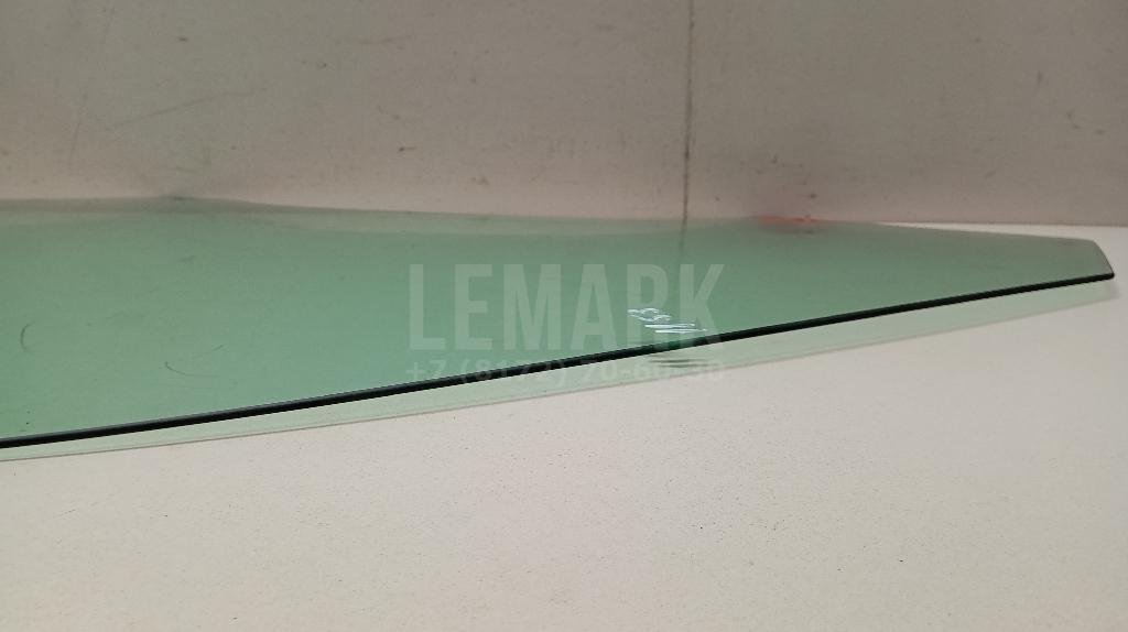 Стекло двери передней левой