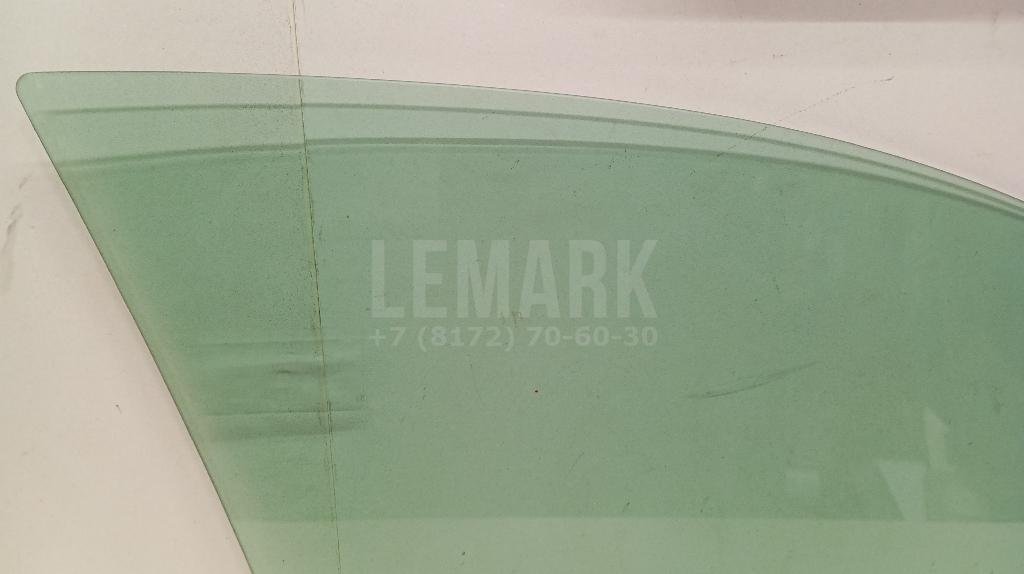 Стекло двери передней левой