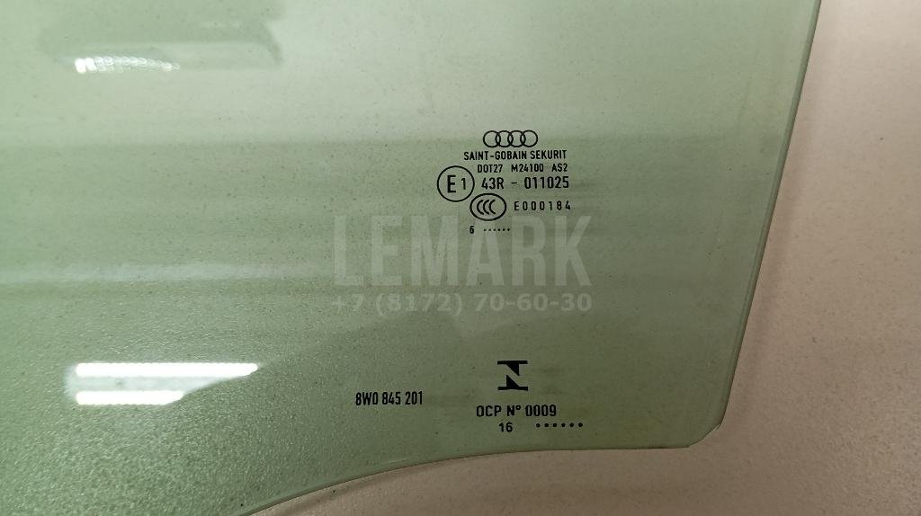 Стекло двери передней левой