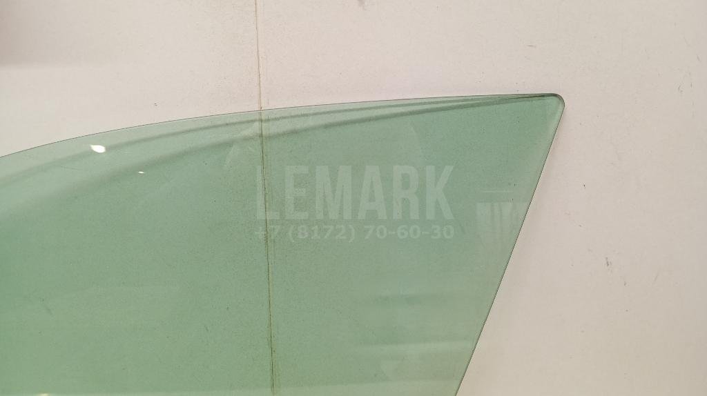 Стекло двери передней левой