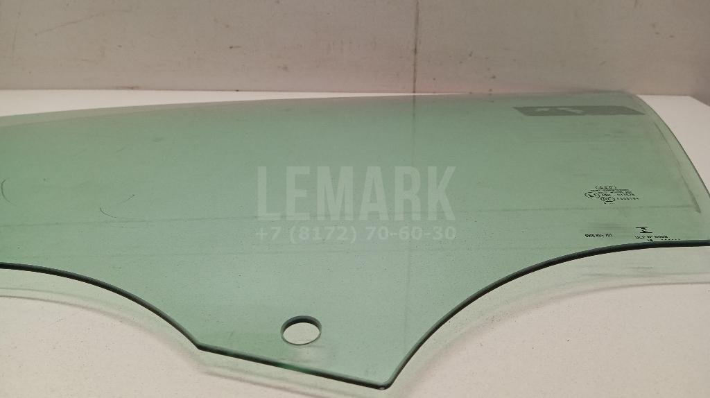 Стекло двери передней левой