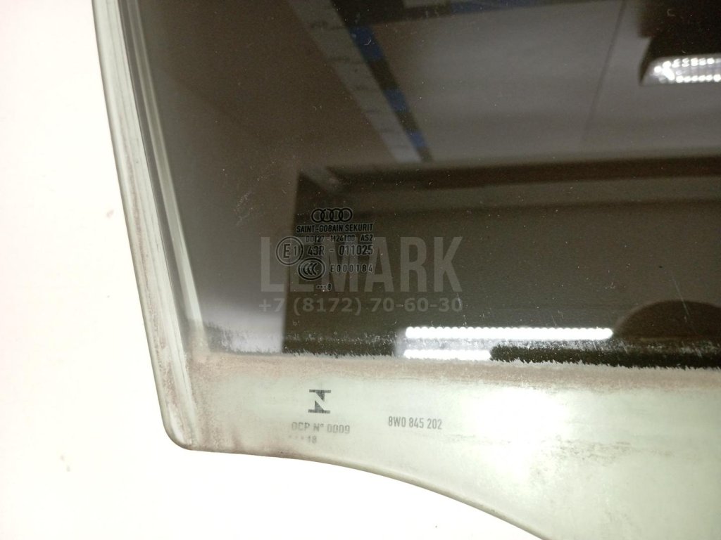 Стекло двери передней правой