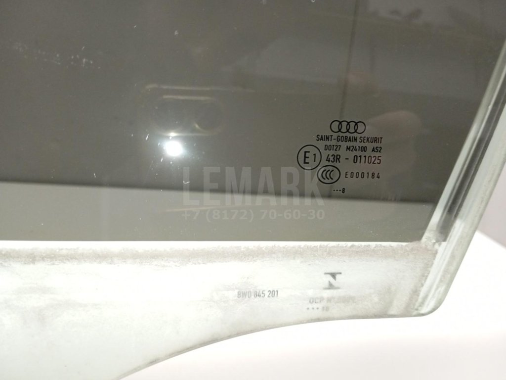 Стекло двери передней левой