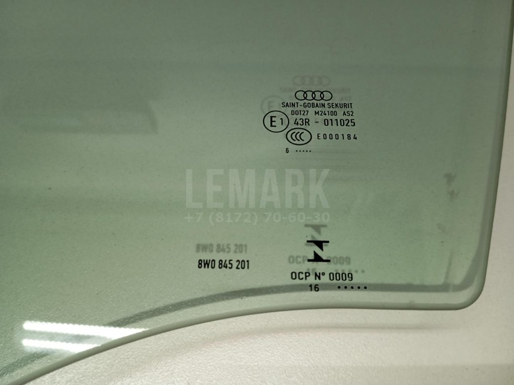 Стекло двери передней левой