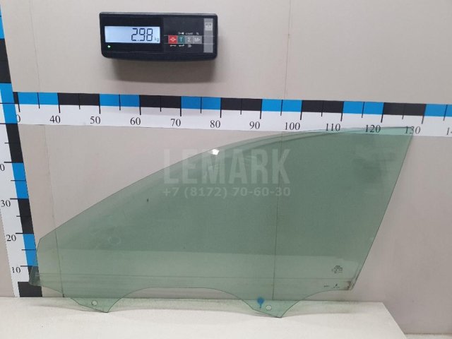 Стекло двери передней левой