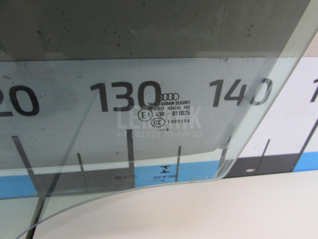 Стекло двери передней левой