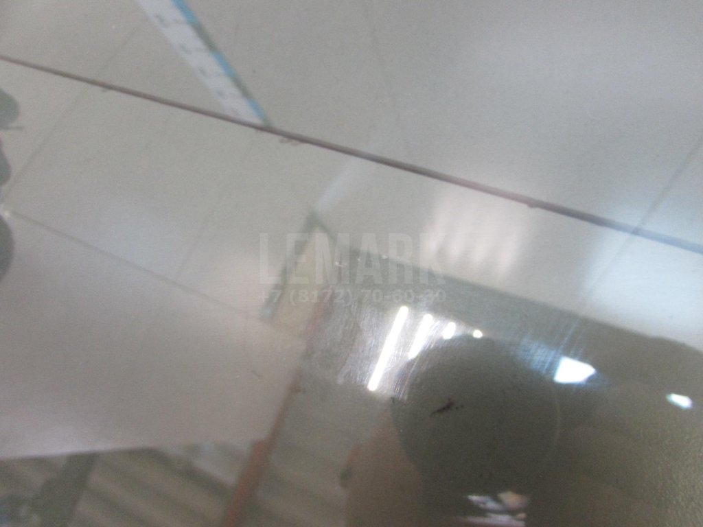 Стекло двери передней левой