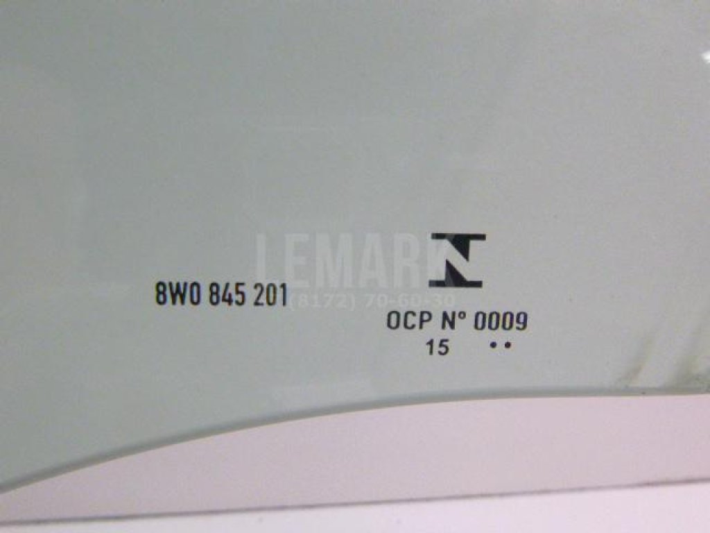 Стекло двери передней левой