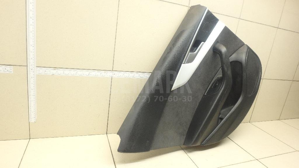 Обшивка двери задней левой