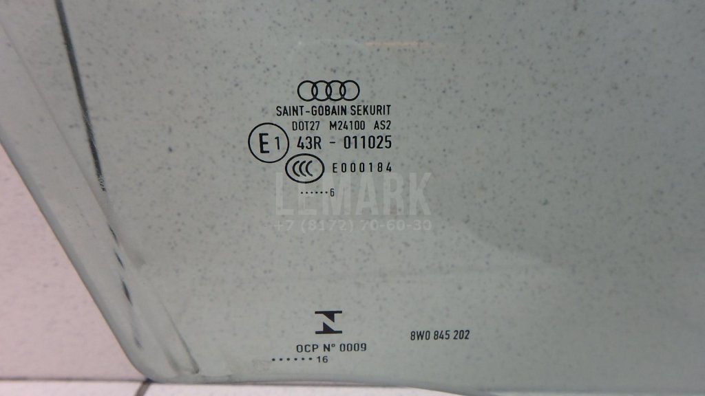 Стекло двери передней правой