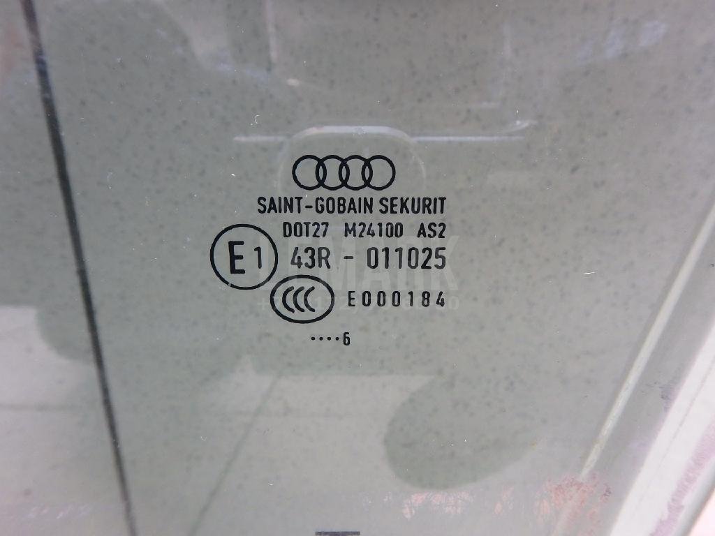 Стекло двери передней левой