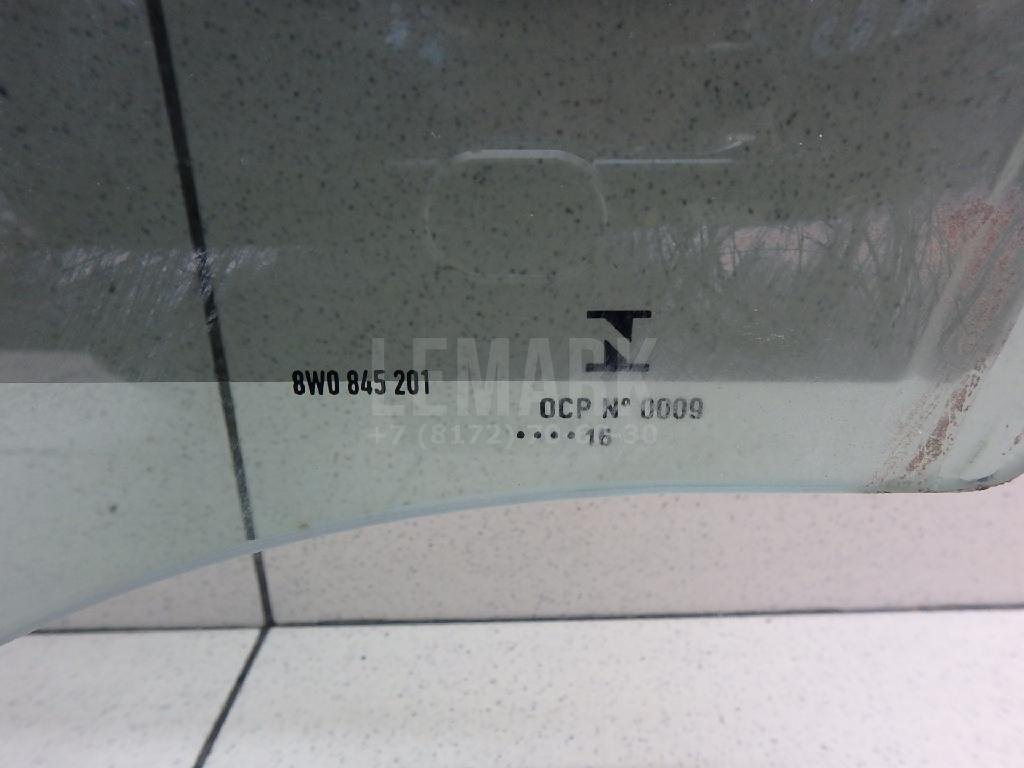 Стекло двери передней левой