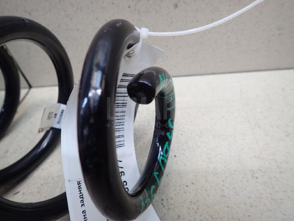 Пружина задняя