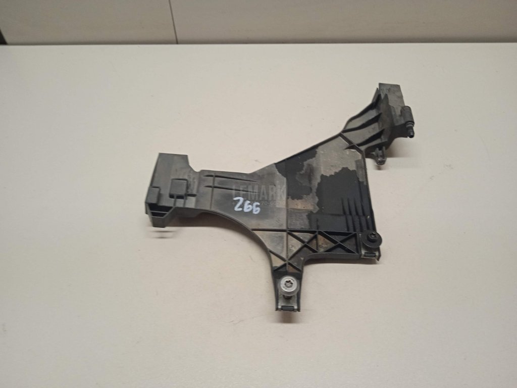 Кронштейн фар левый