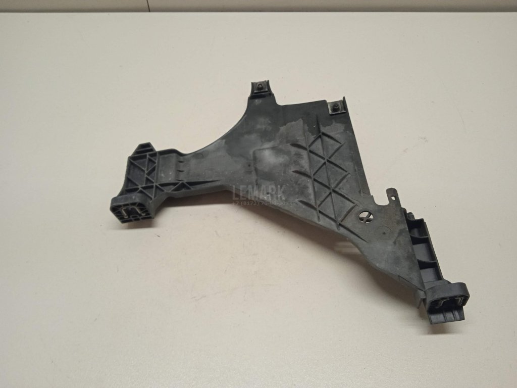 Кронштейн фар левый