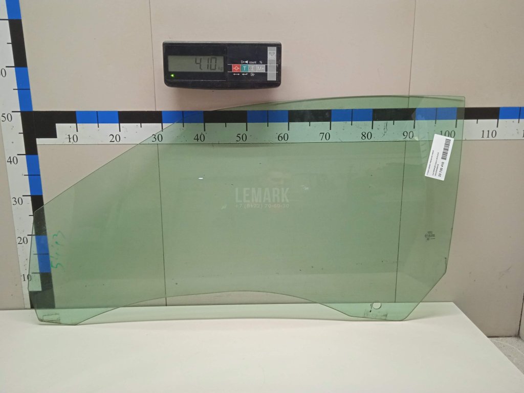 Стекло двери передней левой