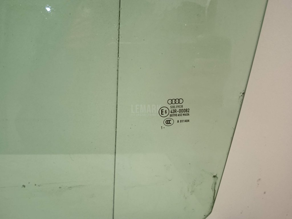 Стекло двери передней левой