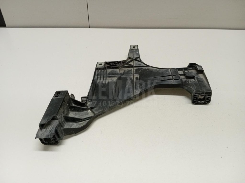 Кронштейн фар левый