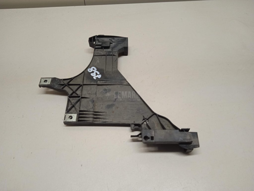 Кронштейн фар левый