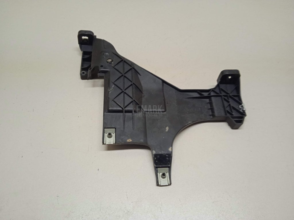 Кронштейн фар левый