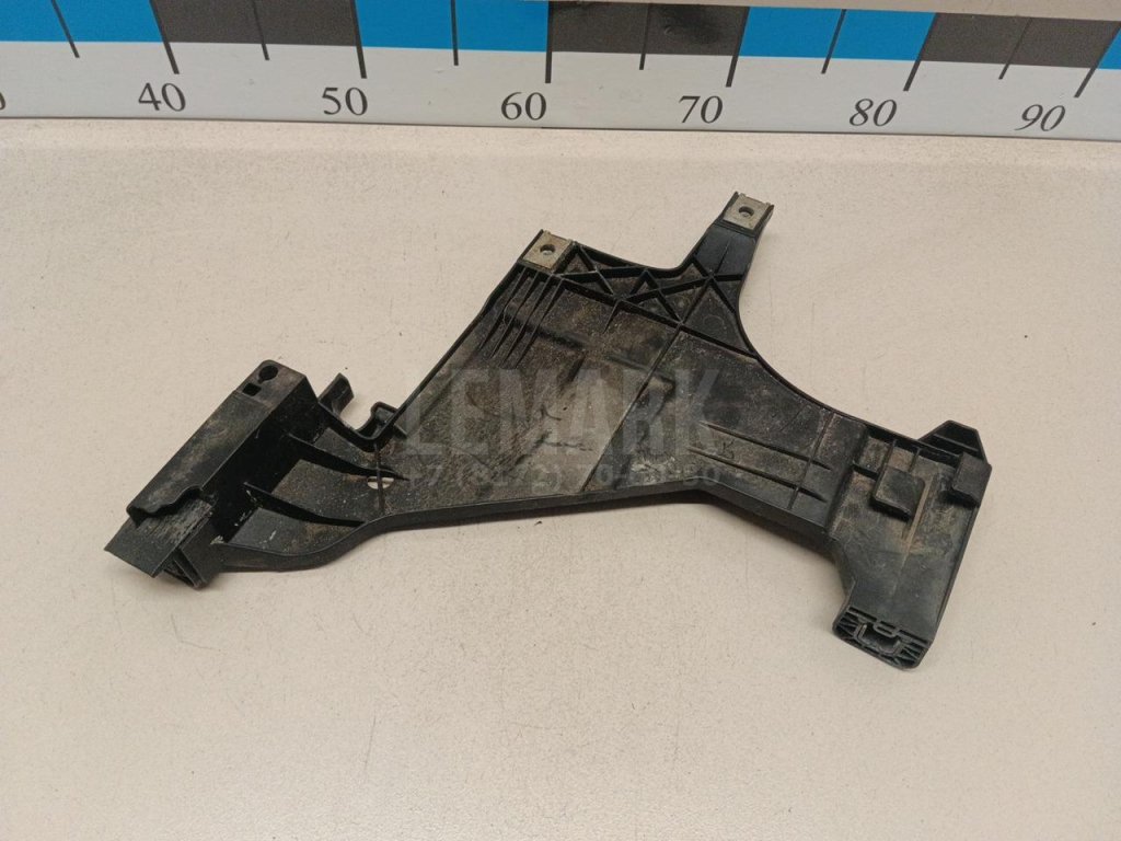 Кронштейн фар левый