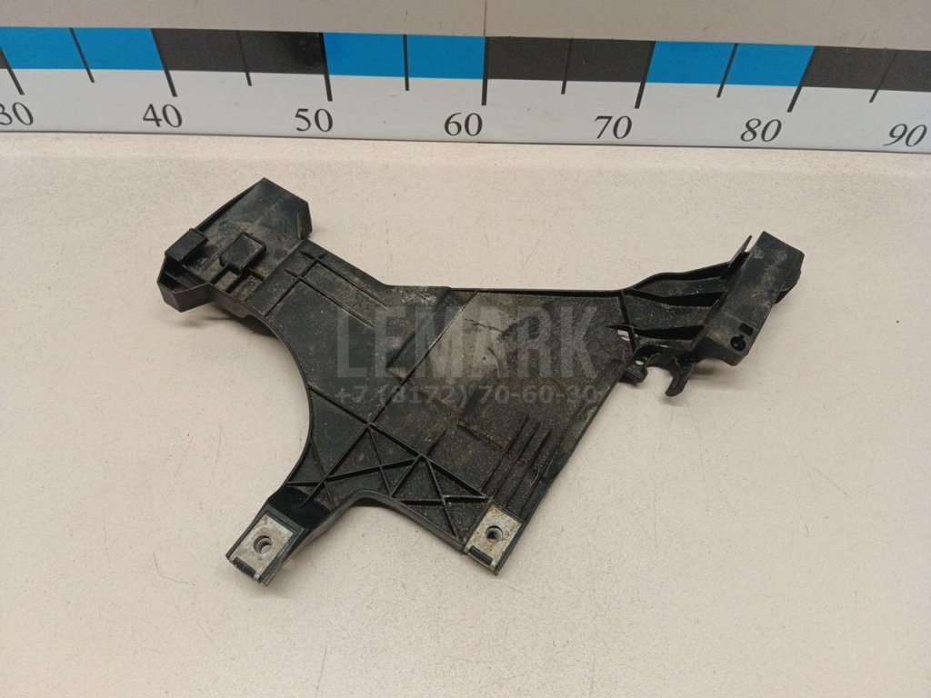 Кронштейн фар левый