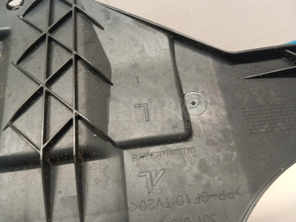 Кронштейн фар левый