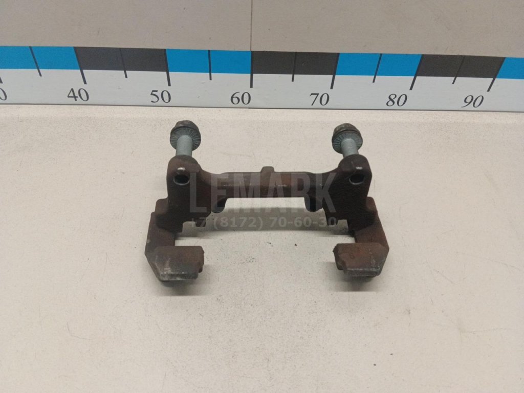 Скоба суппорта переднего