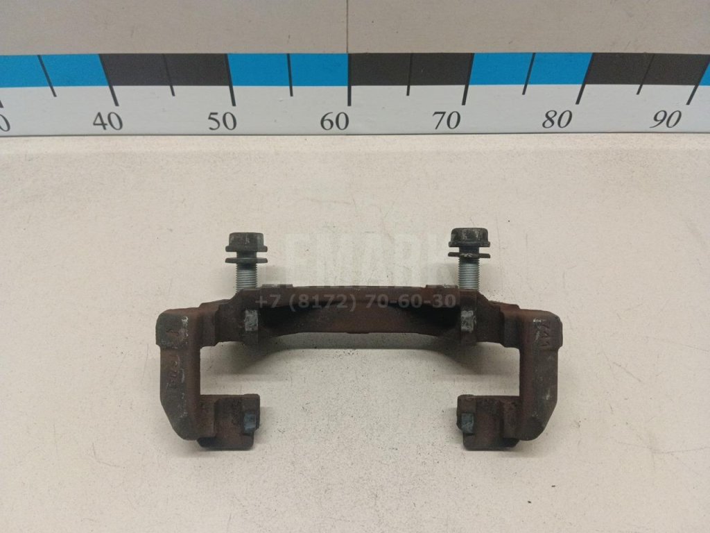 Скоба суппорта переднего