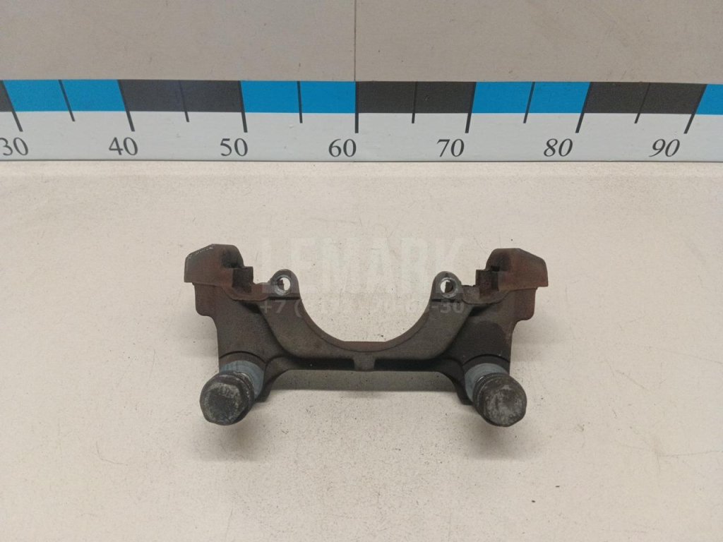 Скоба суппорта переднего