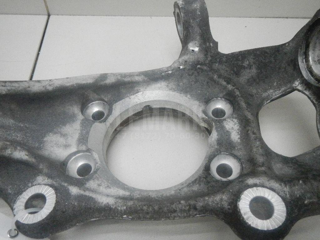 Кулак поворотный передний левый