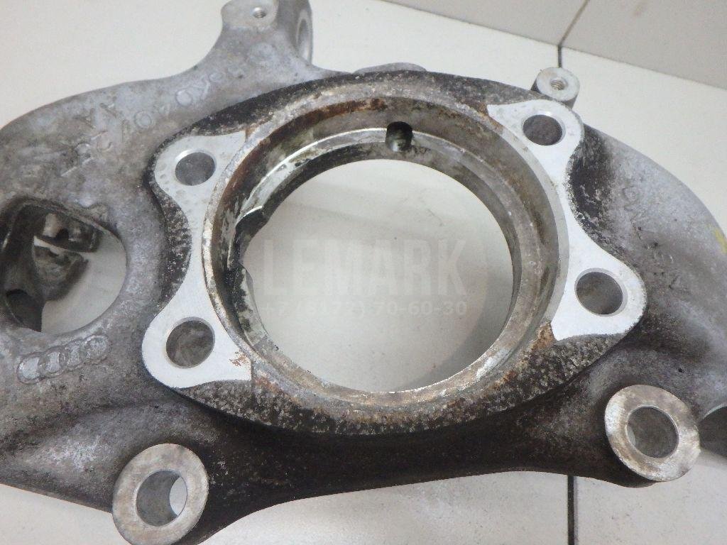 Кулак поворотный передний левый