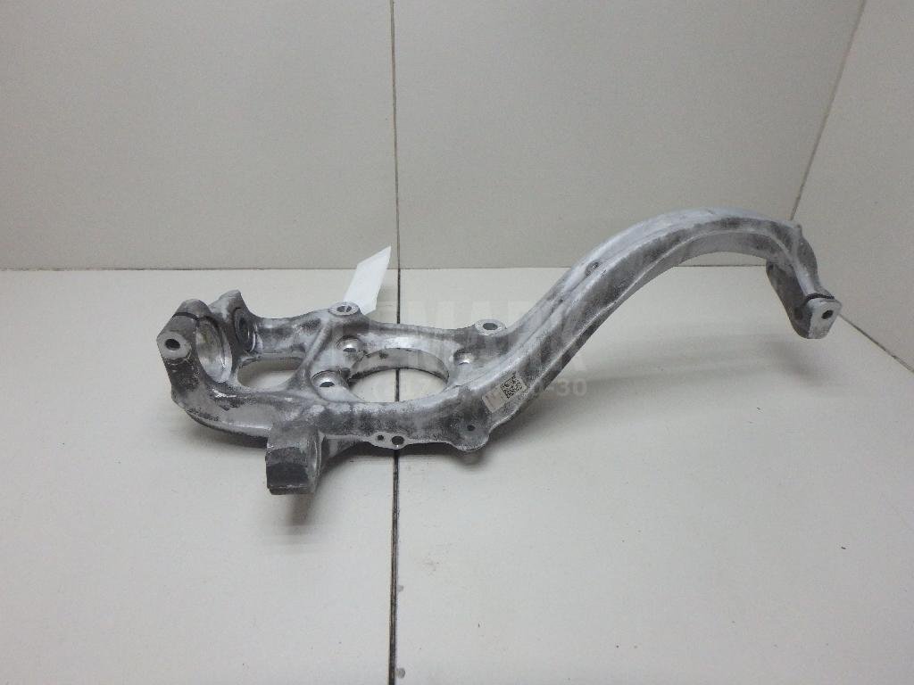 Кулак поворотный передний левый